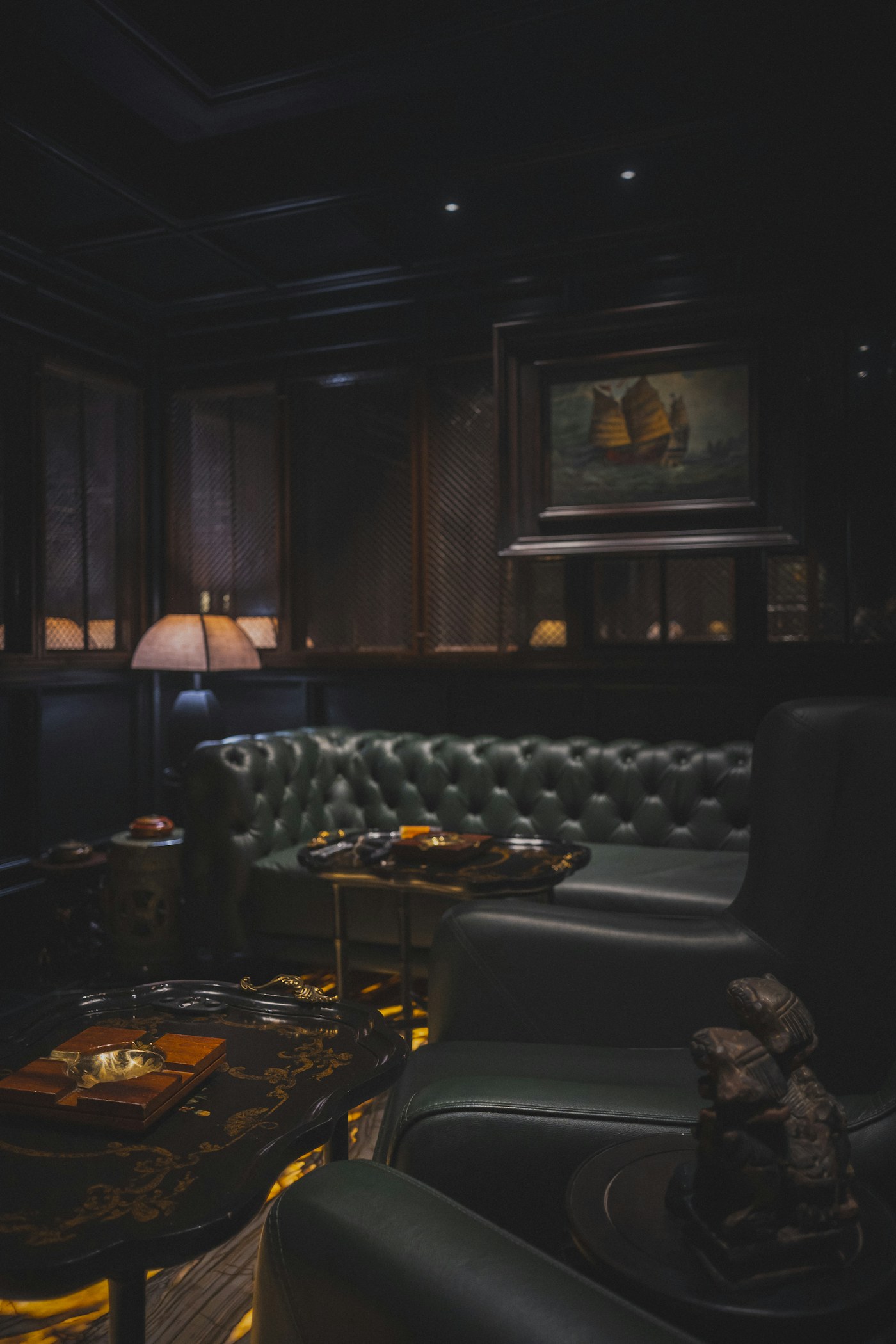 Dark members' club lounge